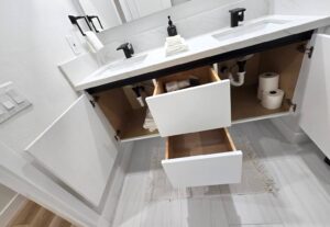 Modern and spotless bathroom in Airbnb Cleaning in Orange County, restocked and organized with essentials by Garfias Cleaning Services.