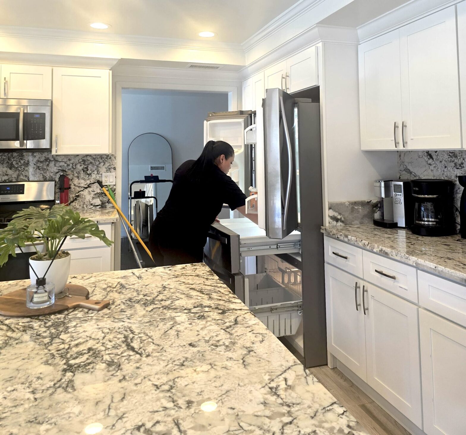 Cleaners doing Kitchen deep cleaning