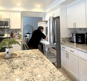 Cleaners doing Kitchen deep cleaning