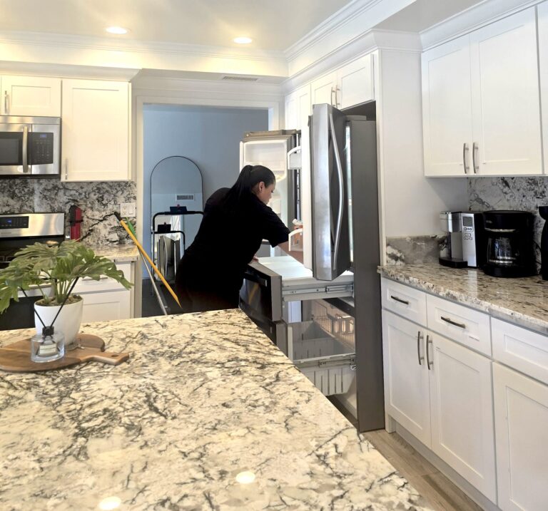 Cleaners doing Kitchen deep cleaning