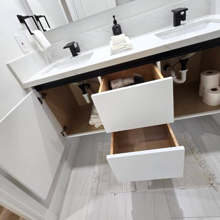 Modern and spotless bathroom in Airbnb Cleaning in Orange County, restocked and organized with essentials by Garfias Cleaning Services.